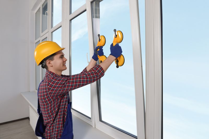 Professional Window Installer at Work